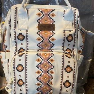 Highly sought Wrangler backpack in Tan.